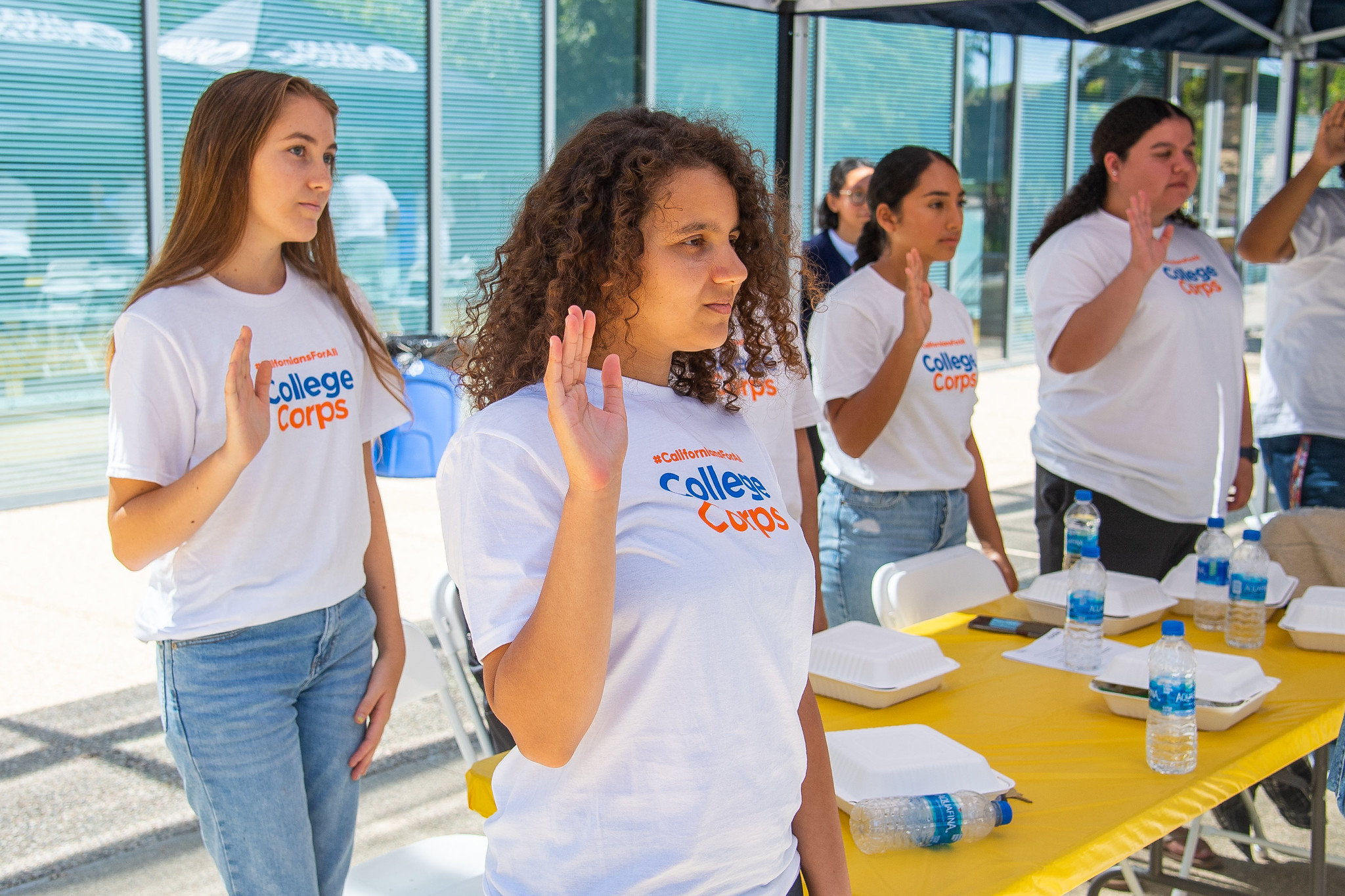 A class of Hancock students are sworn in as California College Corps fellows. 