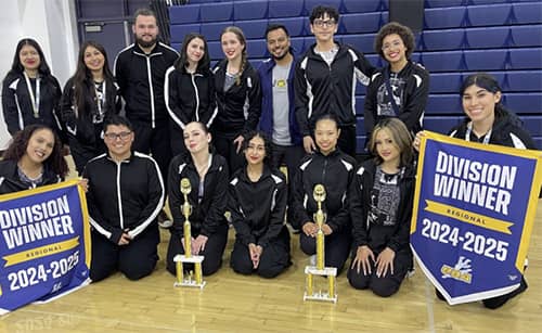 Dance team with trophies